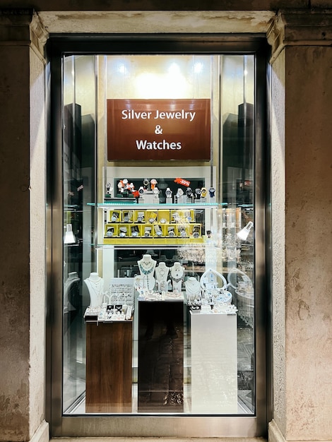 Jewelry shop window caption silver jewelry and watches