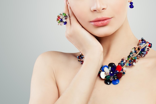 Jewelry woman Colorful necklace ring and earrings portrait