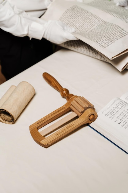 Jewish grogger noisemaker and Hebrew bible for praying and celebration Purim festival Purim Jewish religious holiday of Israel