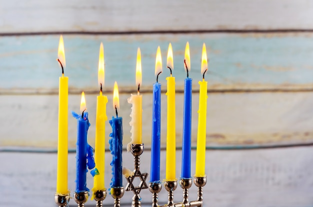 Jewish holiday hannukah with menorah traditional