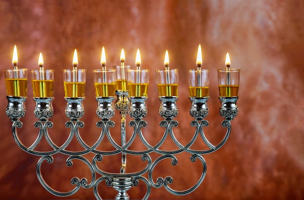 Jewish holiday Hanukkah with menorah traditional candelabra