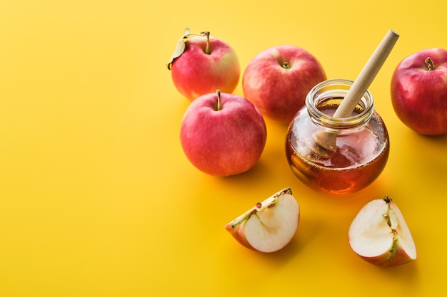 Jewish holiday Rosh Hashanah with honey and apples.