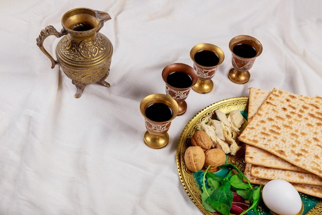 Jewish pesah holiday matzoh unleavened bread with kiddush four cup of wine