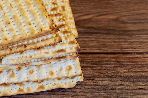 Jewish products food, Jewish Holiday symbol Matzoh for jewish holiday Passover pesah on wooden background. View from above