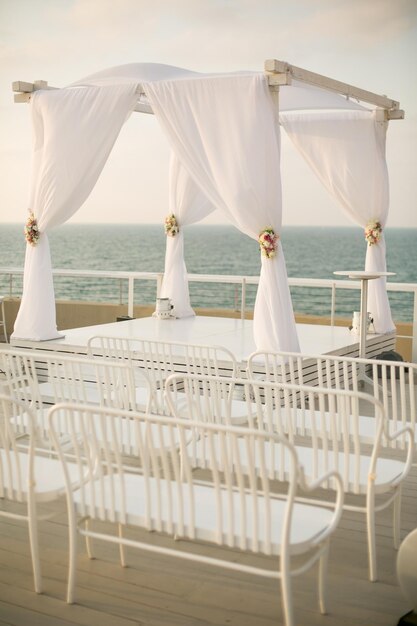 Photo jewish wedding chuppah with sea viewxa