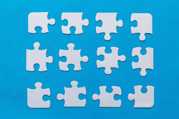 Jigsaw puzzle on blue background