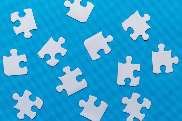 Jigsaw puzzle on blue background
