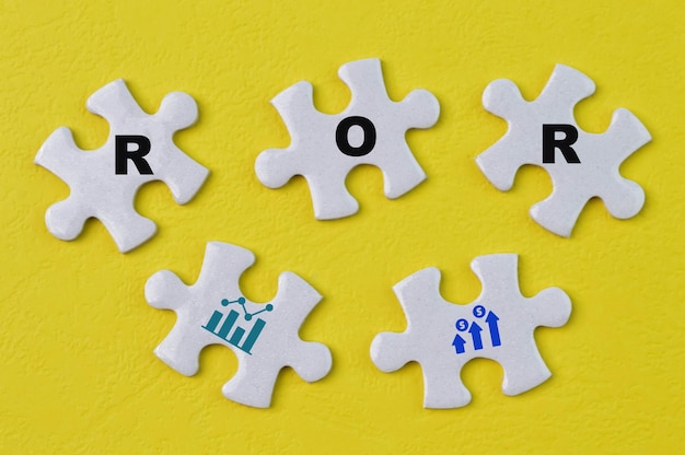 Photo jigsaw puzzles with text ror stands for return on revenue