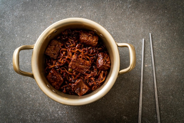 Jjapaguri or Chapaguri Korean Black Beans Spicy Noodles with Beef