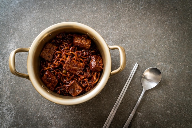 Jjapaguri or Chapaguri Korean Black Beans Spicy Noodles with Beef