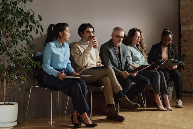 Job candidates waiting for job interview