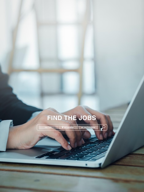 Job or career search employment seek for vacancy or work position concept Find the job text with searching bar appear while business people using laptop computer with copy space vertical style