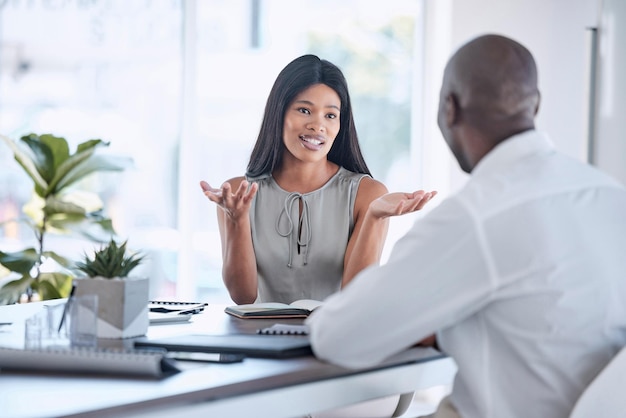 Job interview recruitment and black man and black woman talking having conversation and discussion Management boss and woman in business meeting with man for job employment and hiring in office