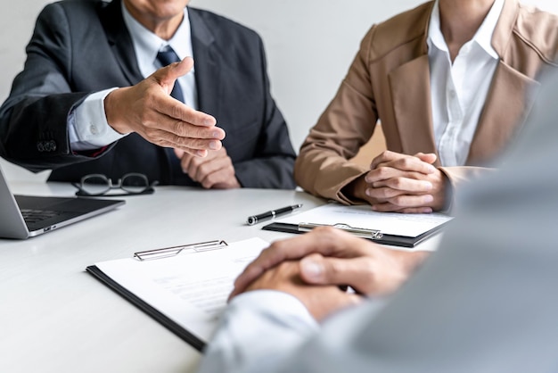 Job interview, Two selection committee manager asking questions to applicant about work history, colloquy dream,  Skill, expertise, experience and businessman listen to candidate answers.