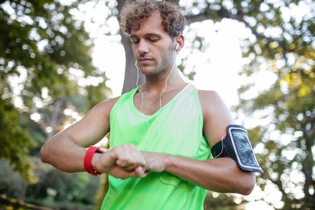 Jogger setting a smartwatch