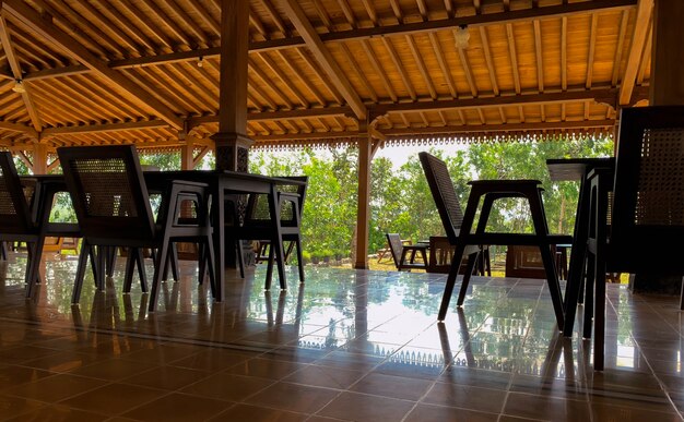 A joglo house, a traditional Javanese house, Indonesia, made of high grade teak wood and handmade carvings