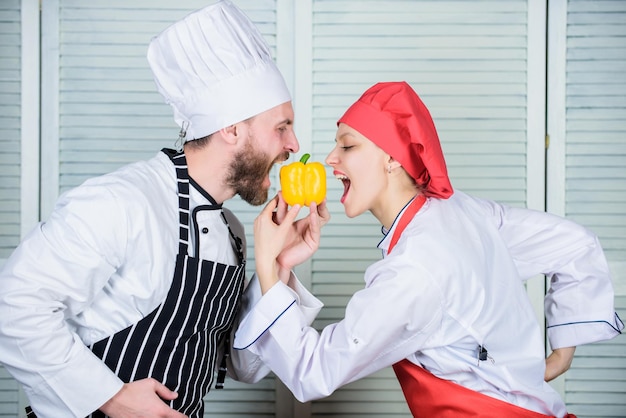 Join healthy lifestyle Man chef hold yellow pepper Just try Vegetarian family Woman and bearded man cooking together Cooking healthy food Fresh vegetarian healthy food recipe Fresh vegetables