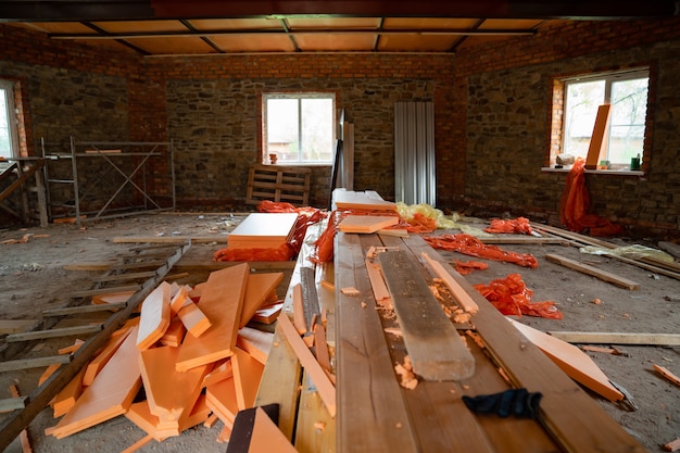 Joinery logs in the room of an unfinished building