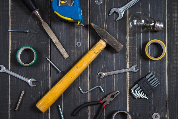 Joinery tools on a dark wooden table Place for the text A concept for Father's Day Top view Flat laying