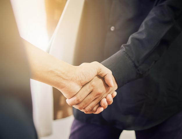 Joint Hands of Two Businessmen