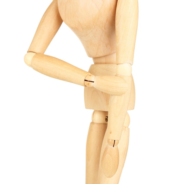 Photo joint pain at wooden mannequin isolated on white