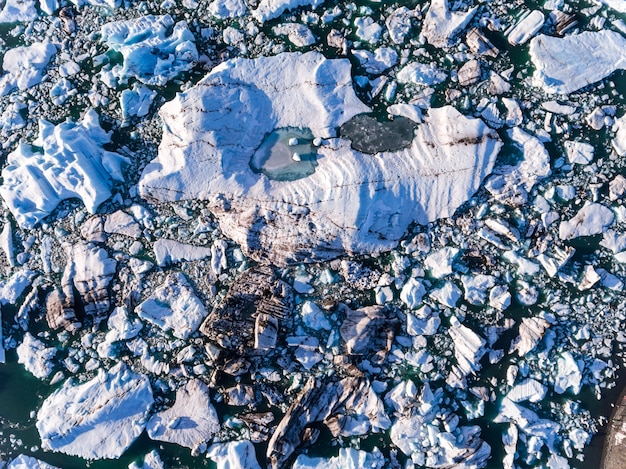 Jokulsarlon glacier lagoon with iceberg aerial view