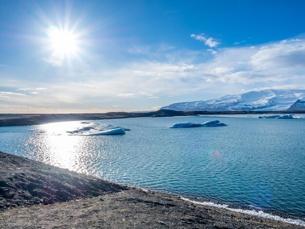 Jokulsarlon iceberg lagoon in winter season with glacier and large iceberg in Iceland