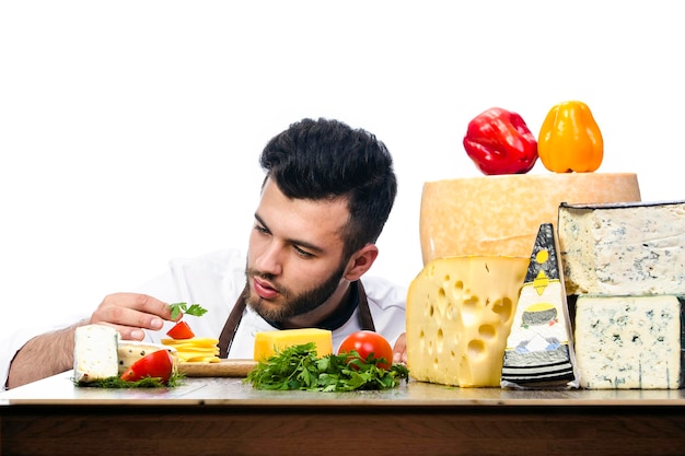 Jonge chef-kok met kazen