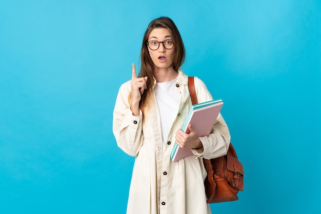 Jonge de studentenvrouw van Ierland over geïsoleerd denkend een idee die de vinger benadrukt