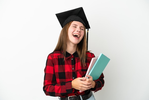Jonge Engelse student vrouw geïsoleerd op witte achtergrond lachen
