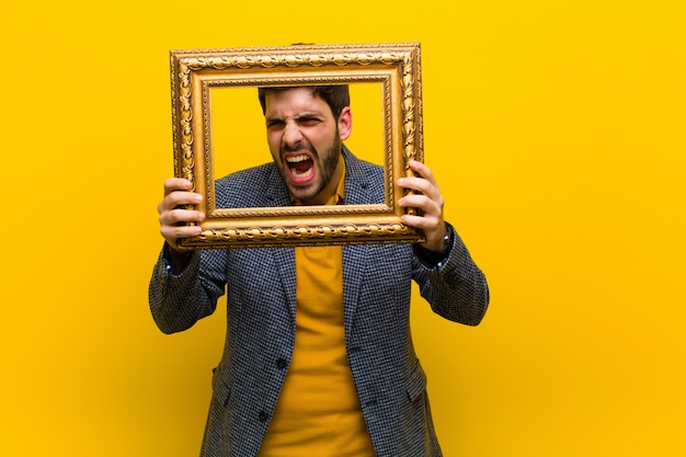 Jonge knappe man met een barok frame