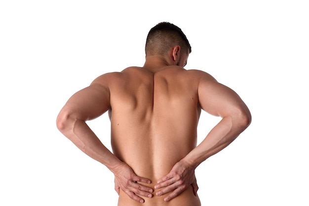 Foto jonge man met rugpijn de atleet klampt zich vast aan een zere rug man bezeerde zijn rug sportgeneeskunde concept
