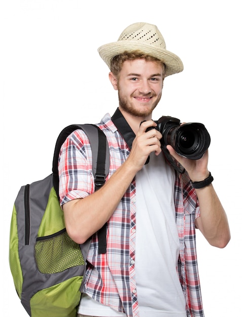 Jonge reizende man die een foto neemt