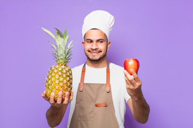 Jonge Spaanse man twijfelende of onzekere uitdrukking. chef-kok concept