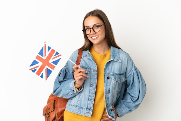 Jonge Spaanse vrouw met een vlag van het Verenigd Koninkrijk geïsoleerd