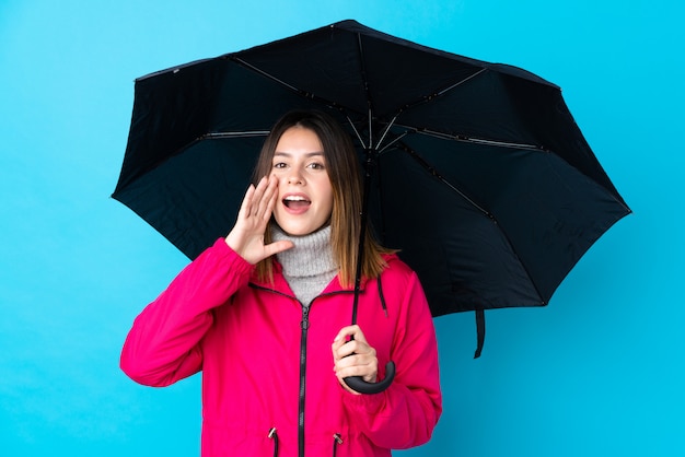 Jonge vrouw met paraplu