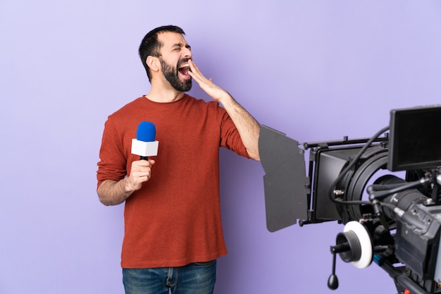 Journalist man over isolated wall