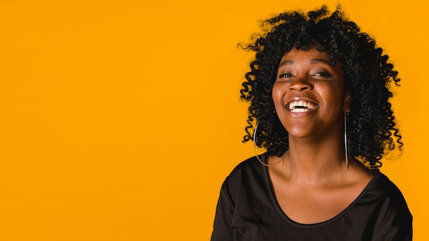 Joyful African American woman in studio