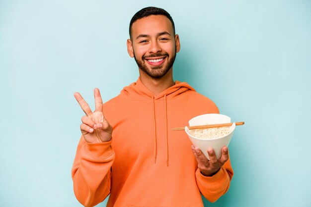 Joyful and carefree showing a peace symbol with fingers