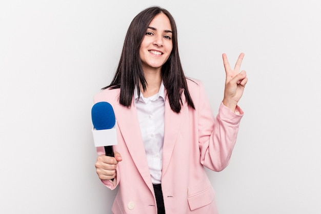 Joyful and carefree showing a peace symbol with fingers