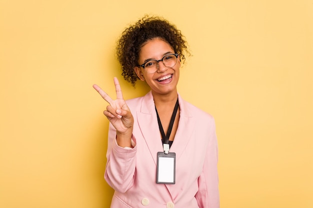 Joyful and carefree showing a peace symbol with fingers