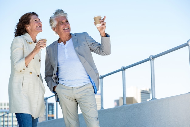 Joyful couple looking away