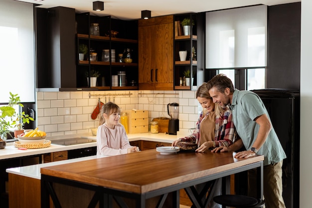 Joyful Family Enjoying Homemade Chocolate Cake in Cozy Kitchen