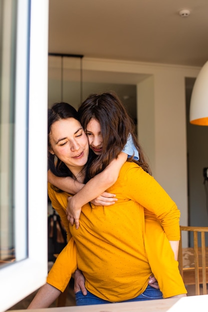 The joyful girls happily spends time at home