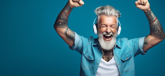 Joyful senior man listening to music in headphones