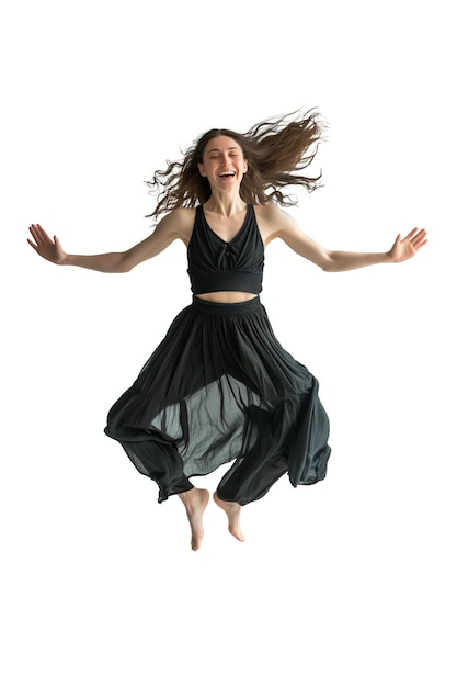 Photo joyful woman in black dress jumping isolated on white background