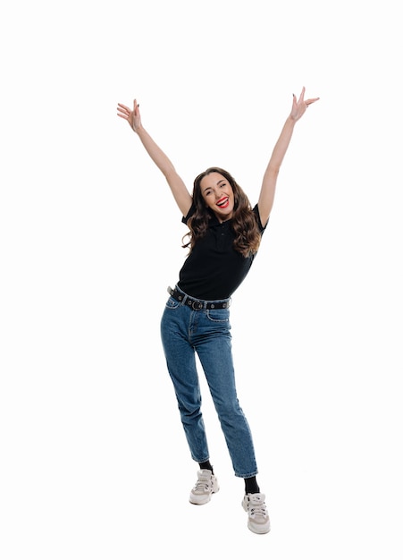 joyful woman leaping through the sky with exhilaration a woman jumping in the air with her hands up