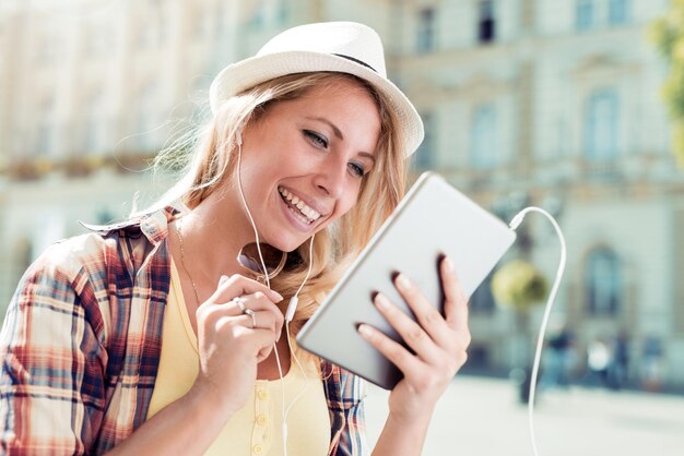 Joyful woman listening to music