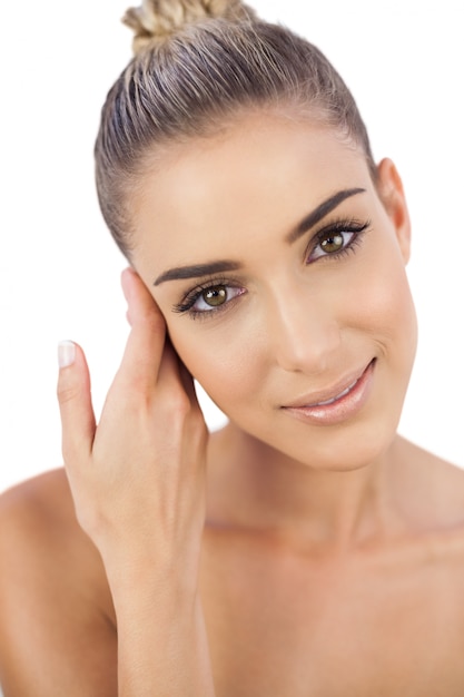 Joyful woman looking at camera