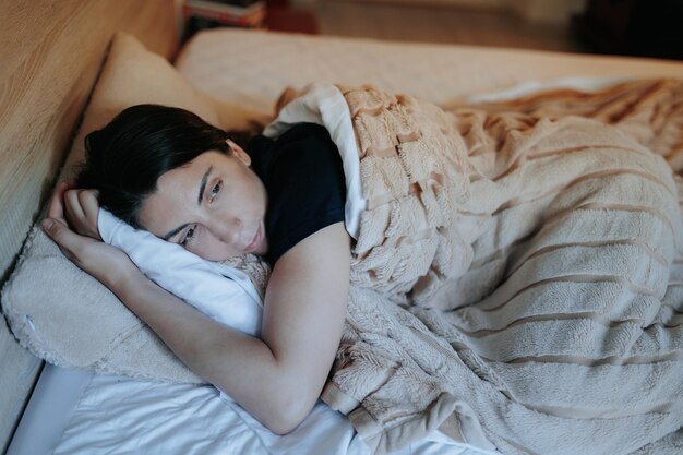 joyful young woman preparing for bed in a peaceful nighttime setting